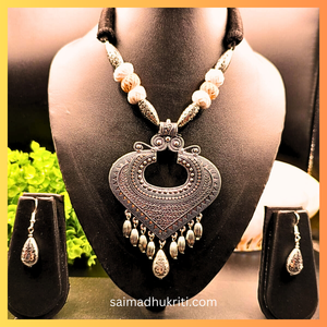 Beige Cotton Bead Silver Pendent