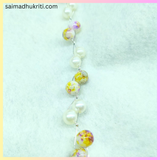 Yellow and pearl bracelet