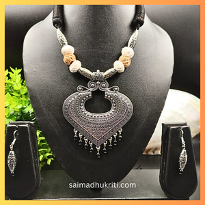 Beige Cotton Bead Silver Pendent